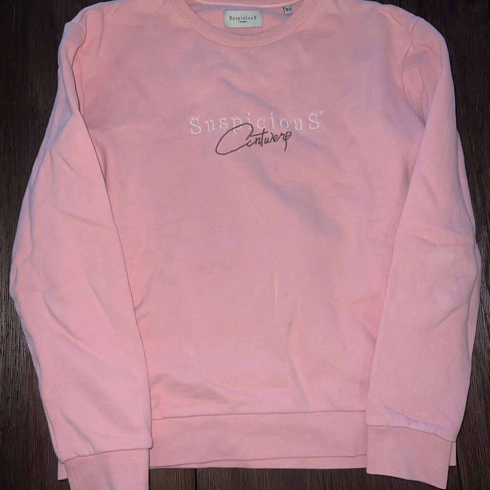 Pink Suspicious Antwerp crewneck sweater. 
Size XS
Very lightly worn (< 3 times)